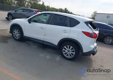 2013 Mazda Cx-5 Sport z USA, uszkodzony, nr VIN JM3KE4BE1D0154871